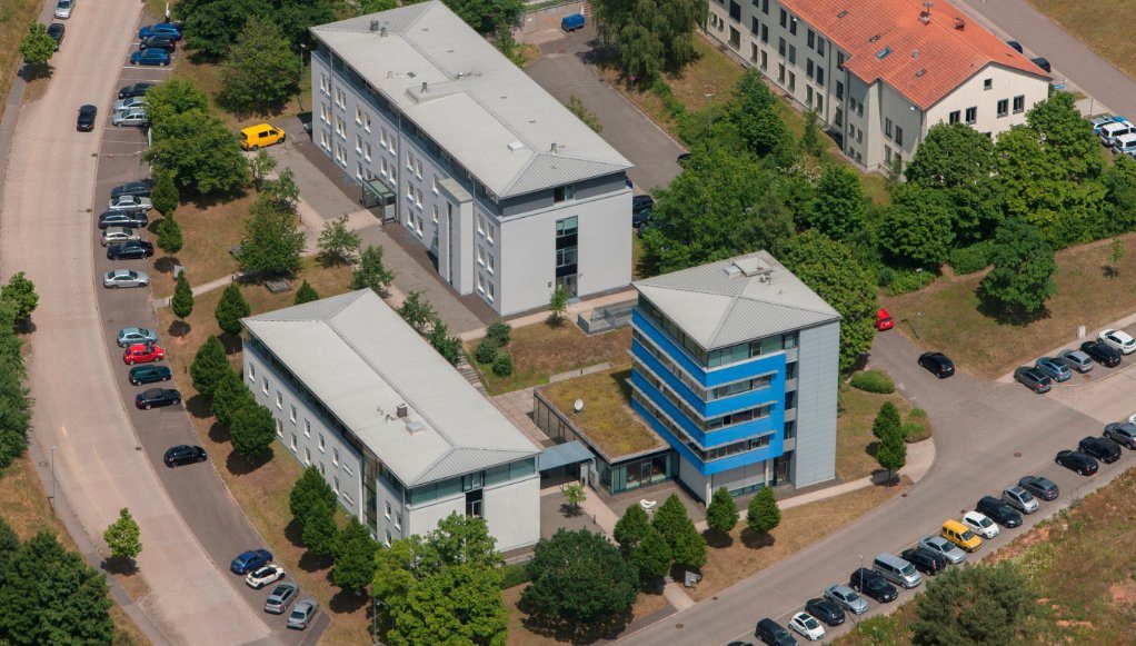 Aerial view of a business park in the Saarland — Magnuscom's home region